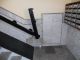 Brazo abatible plegado para el acceso a contadores en escalera de Novelda (Alicante)