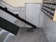Brazo abatible sin plegar en instalación de plataforma salva escaleras en Novelda (Alicante)